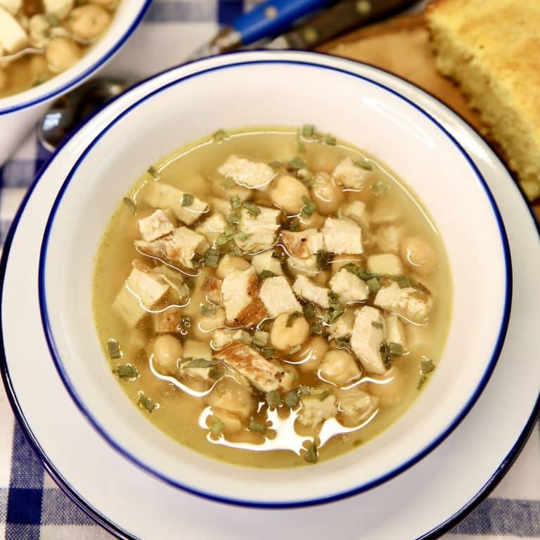 Bowl of chickpea and chicken soup.