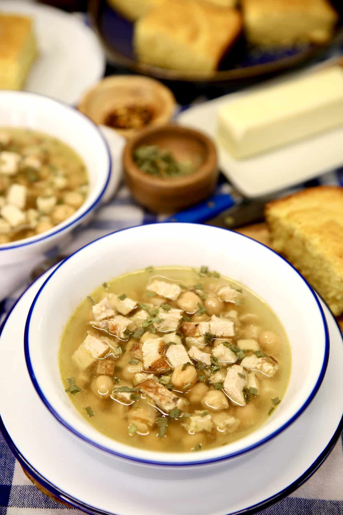 Bowl of chickpea chicken soup.