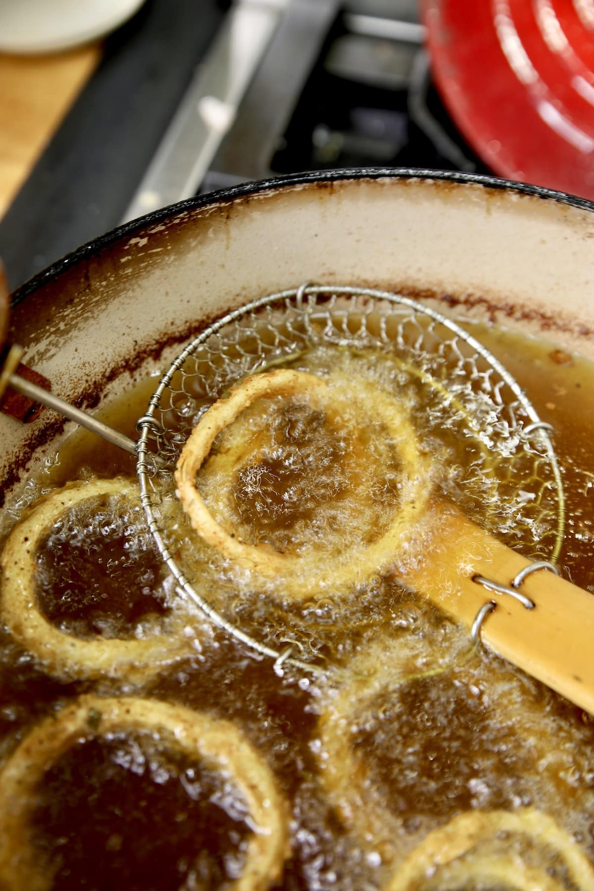 Frying onion rings.