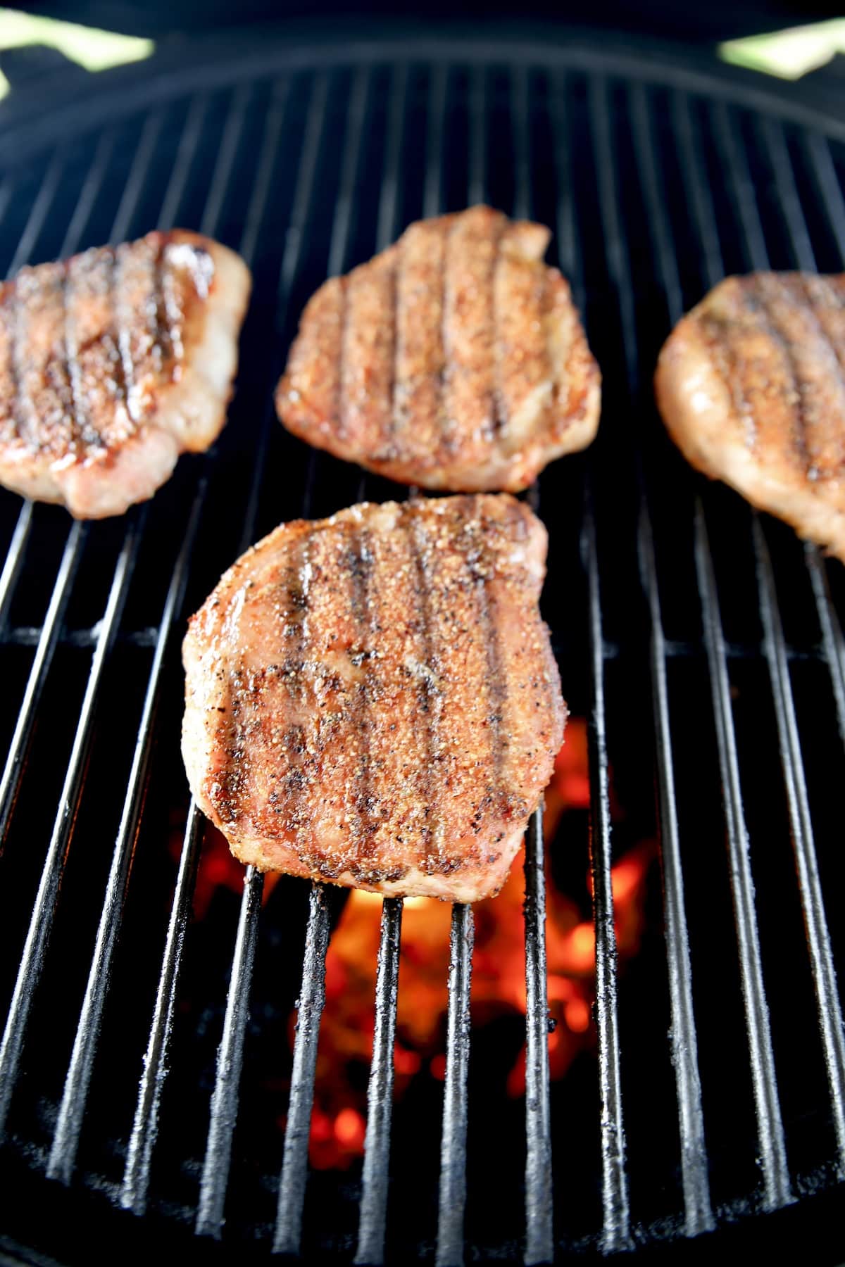Grilling 4 pork chops. 