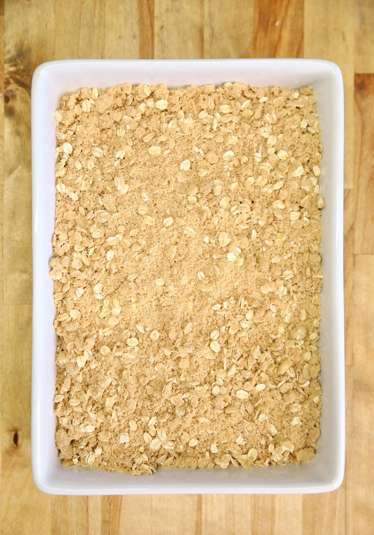 Rectangle baking dish with fruit crisp topping.