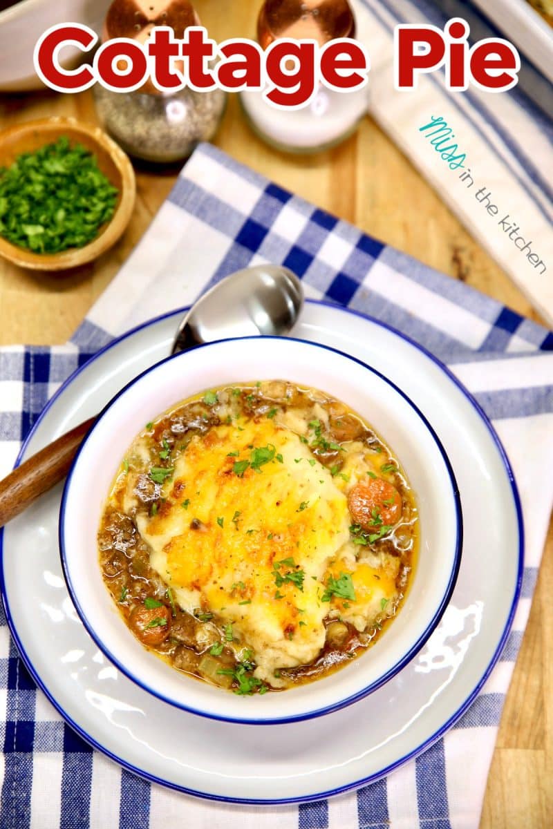 Table setting with bowl of cottage pie. Text overlay.