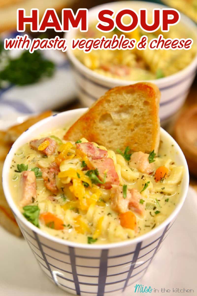 Ham Soup in a mug with toasted bread slice in the top. Text overlay.