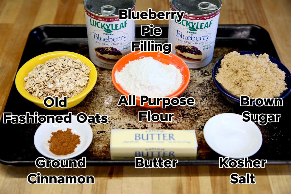 Ingredients for blueberry crisp with text labels.