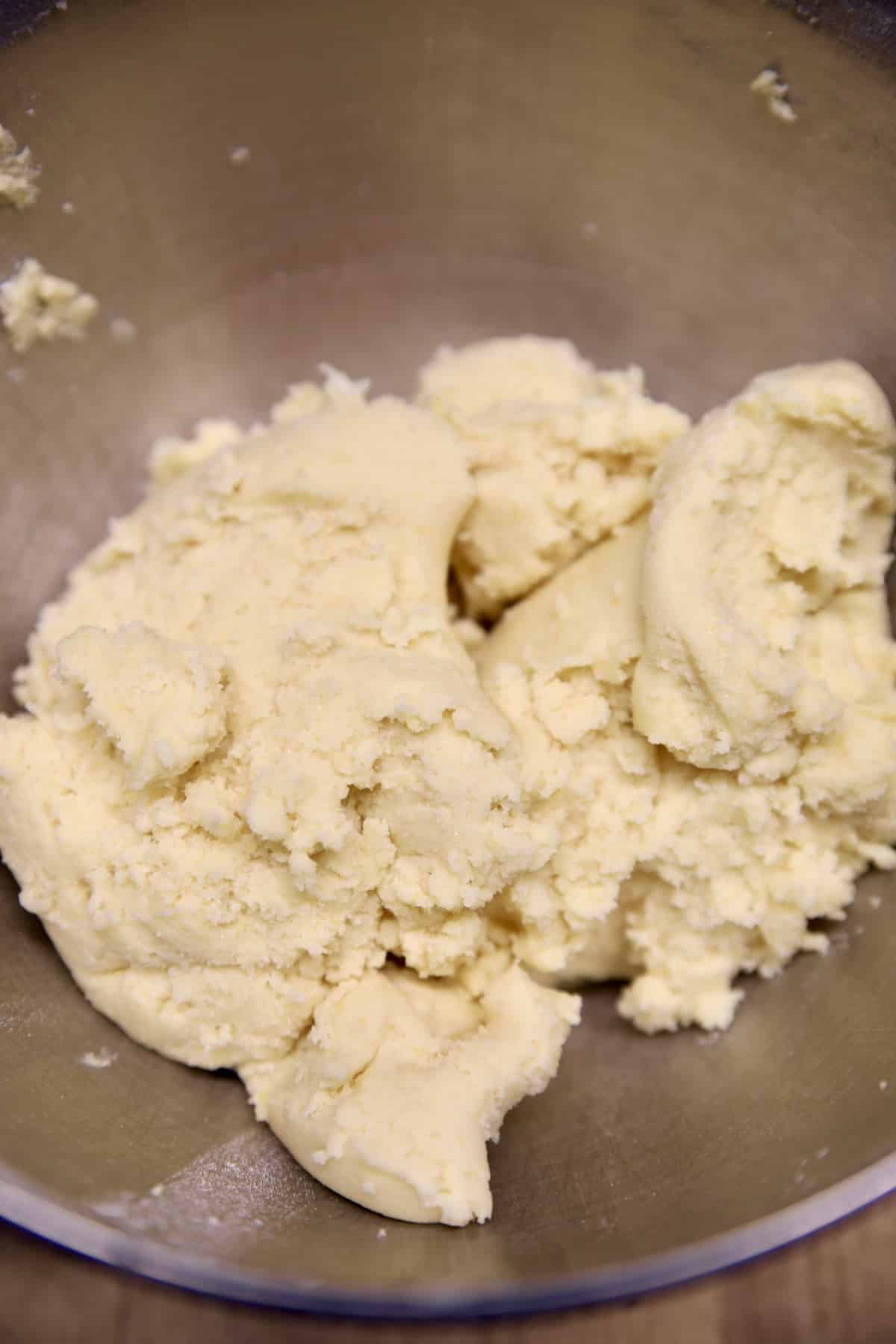 Thumbprint cookie dough in a bowl.