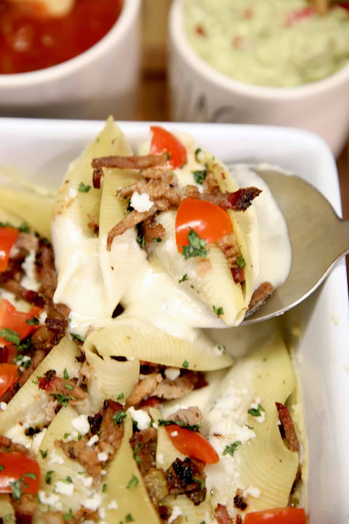 Spoonful of brisket stuffed shells.