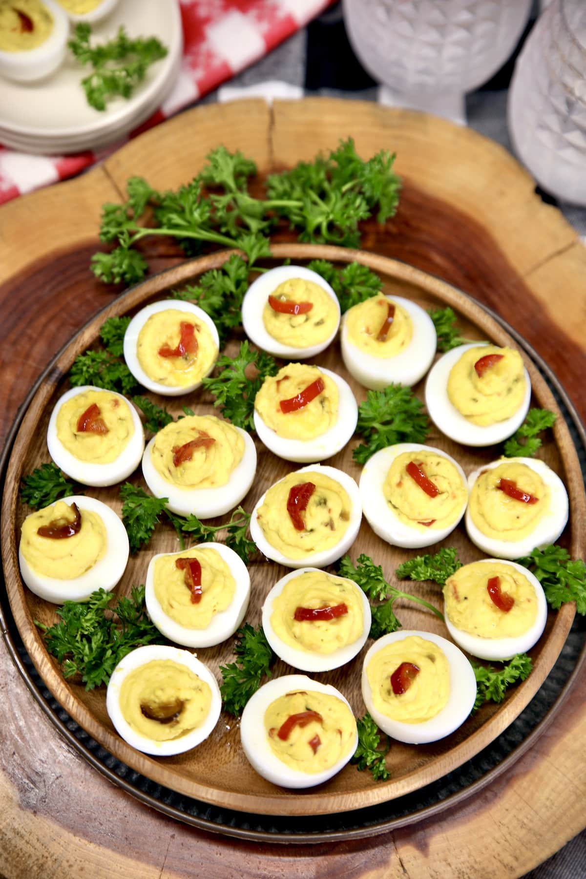 Platter of Deviled Eggs with candied jalapeños. 