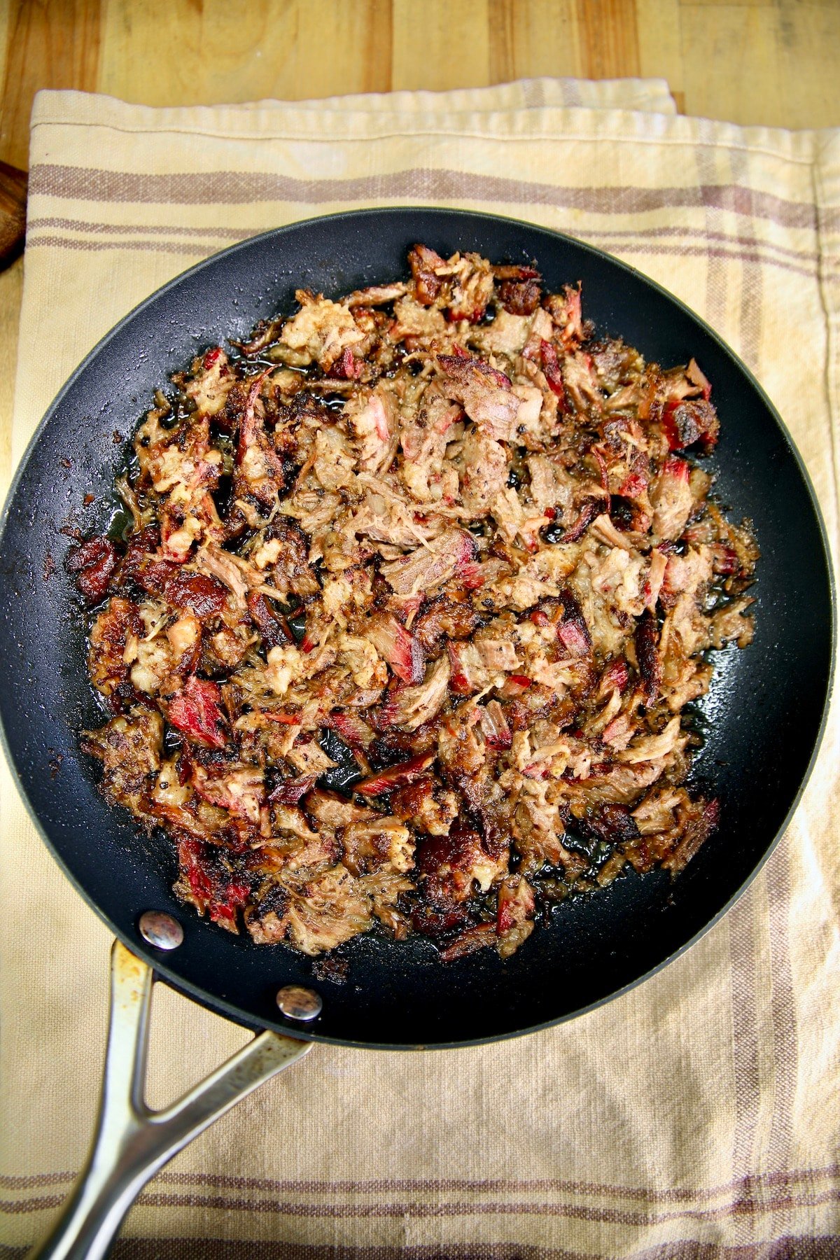 Skillet of chopped brisket.