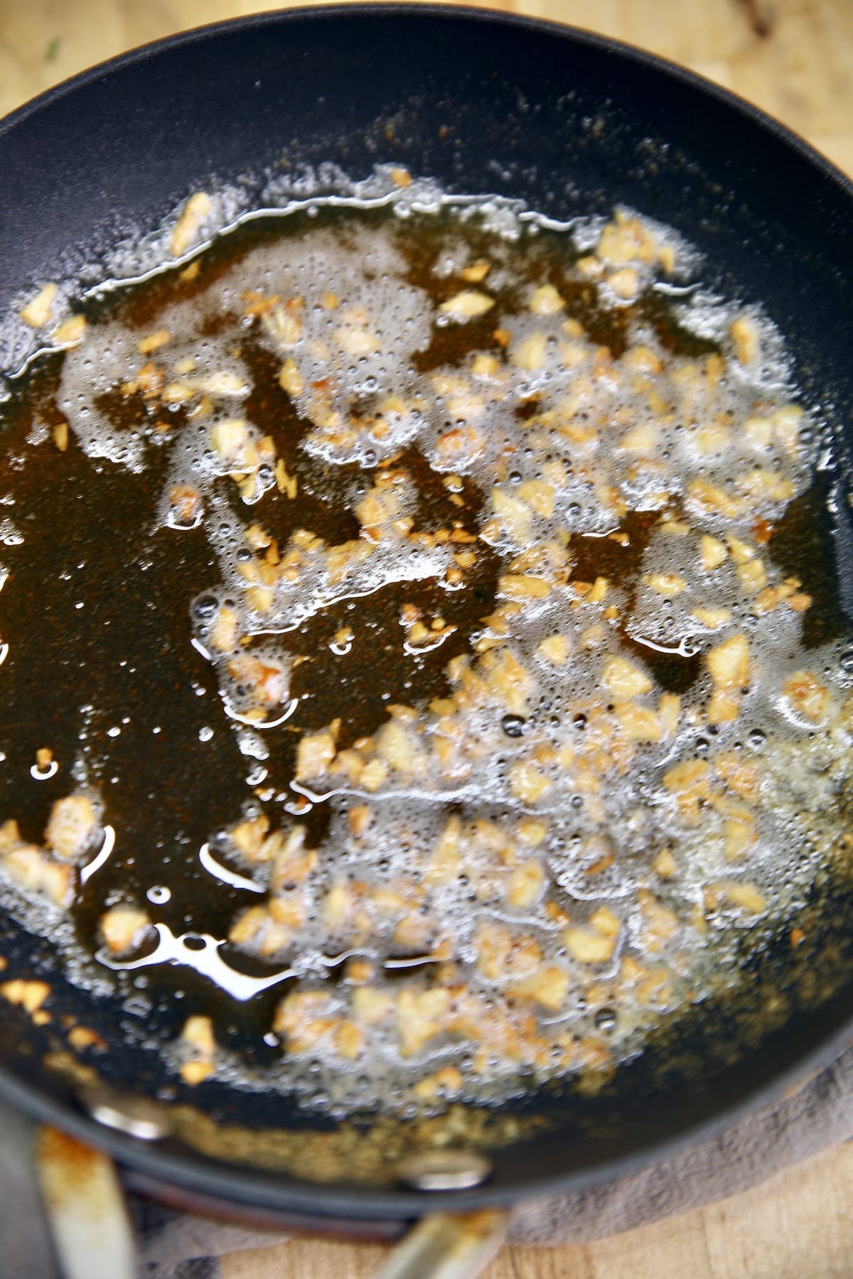 Toasted garlic butter in a skillet.