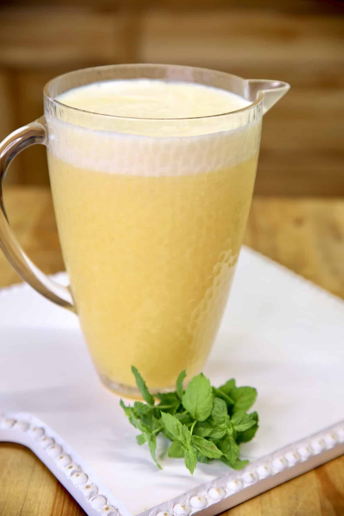 Pitcher of pineapple peach moscato punch.