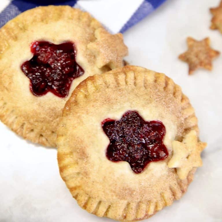 2 Blackberry Hand Pies on a plate.