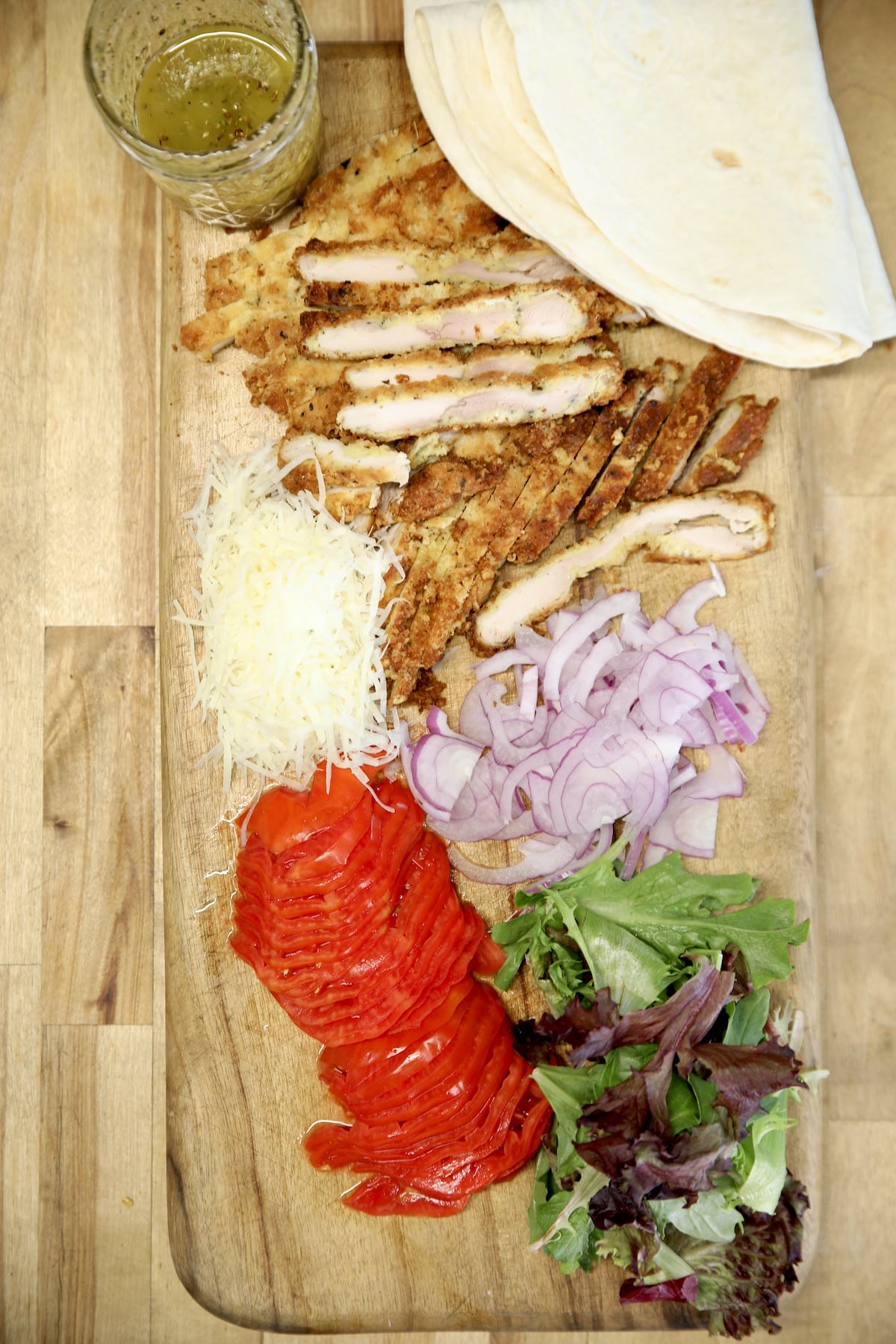 Ingredients for chicken parmesan wraps.
