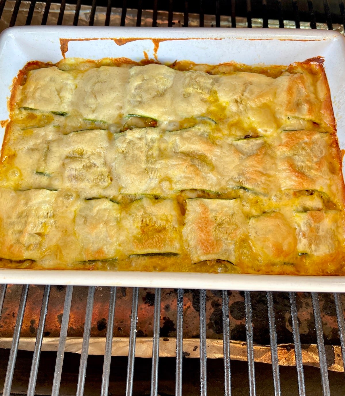 Baked zucchini casserole on a grill.