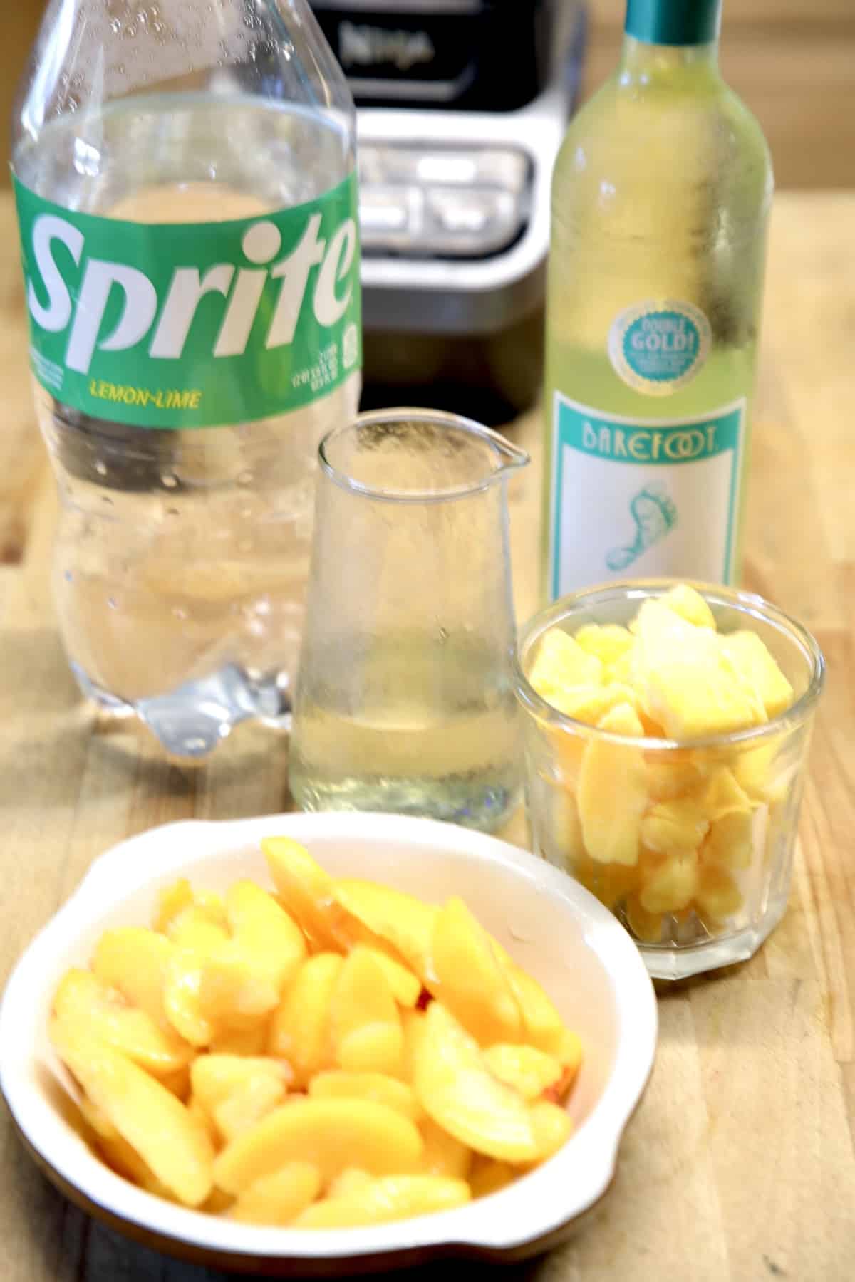 Moscato punch with frozen peaches and mango.