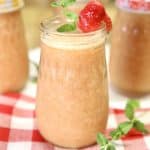 Strawberry mango wine coolers in mason jars.