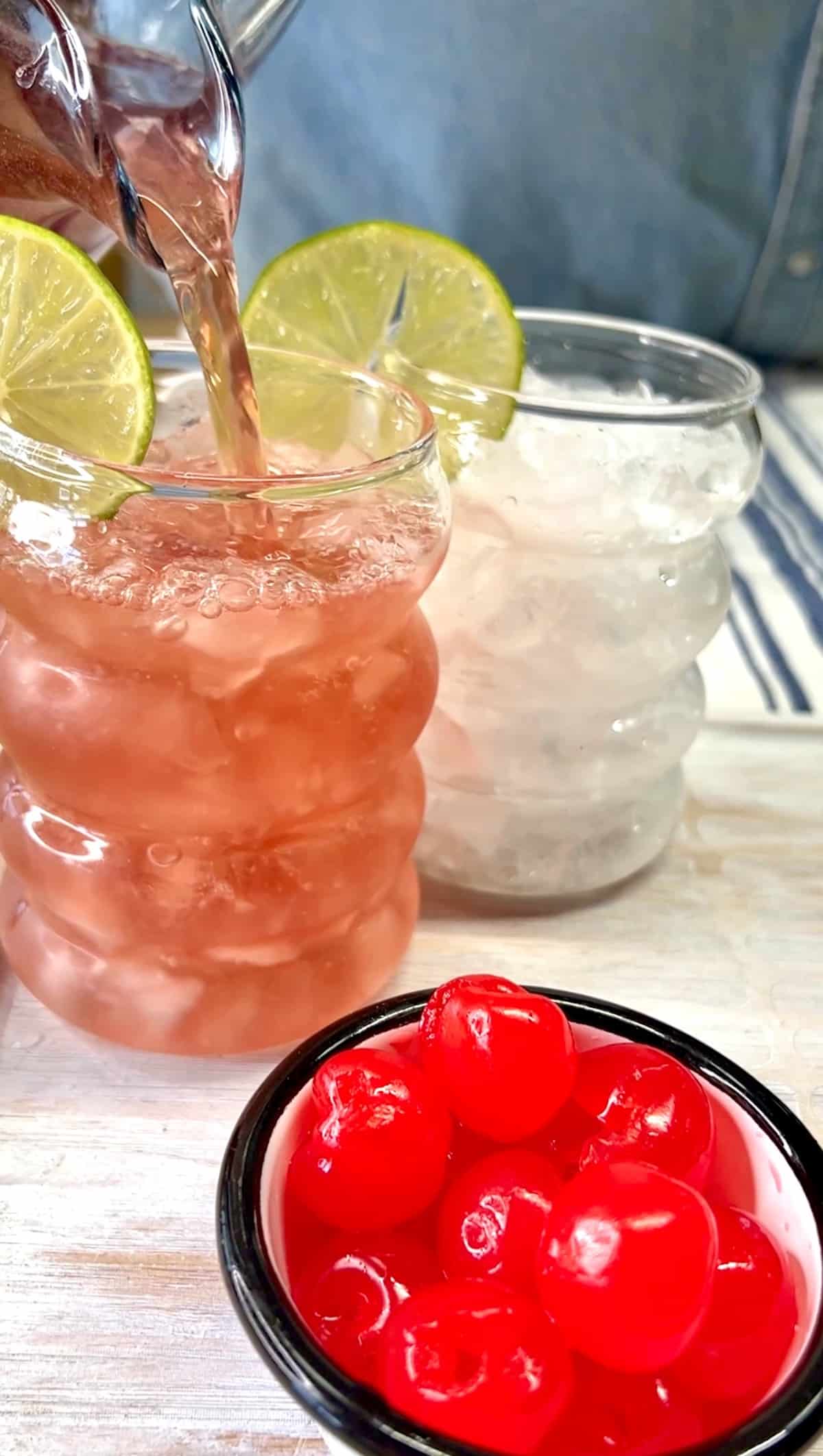 Filling glasses with punch.