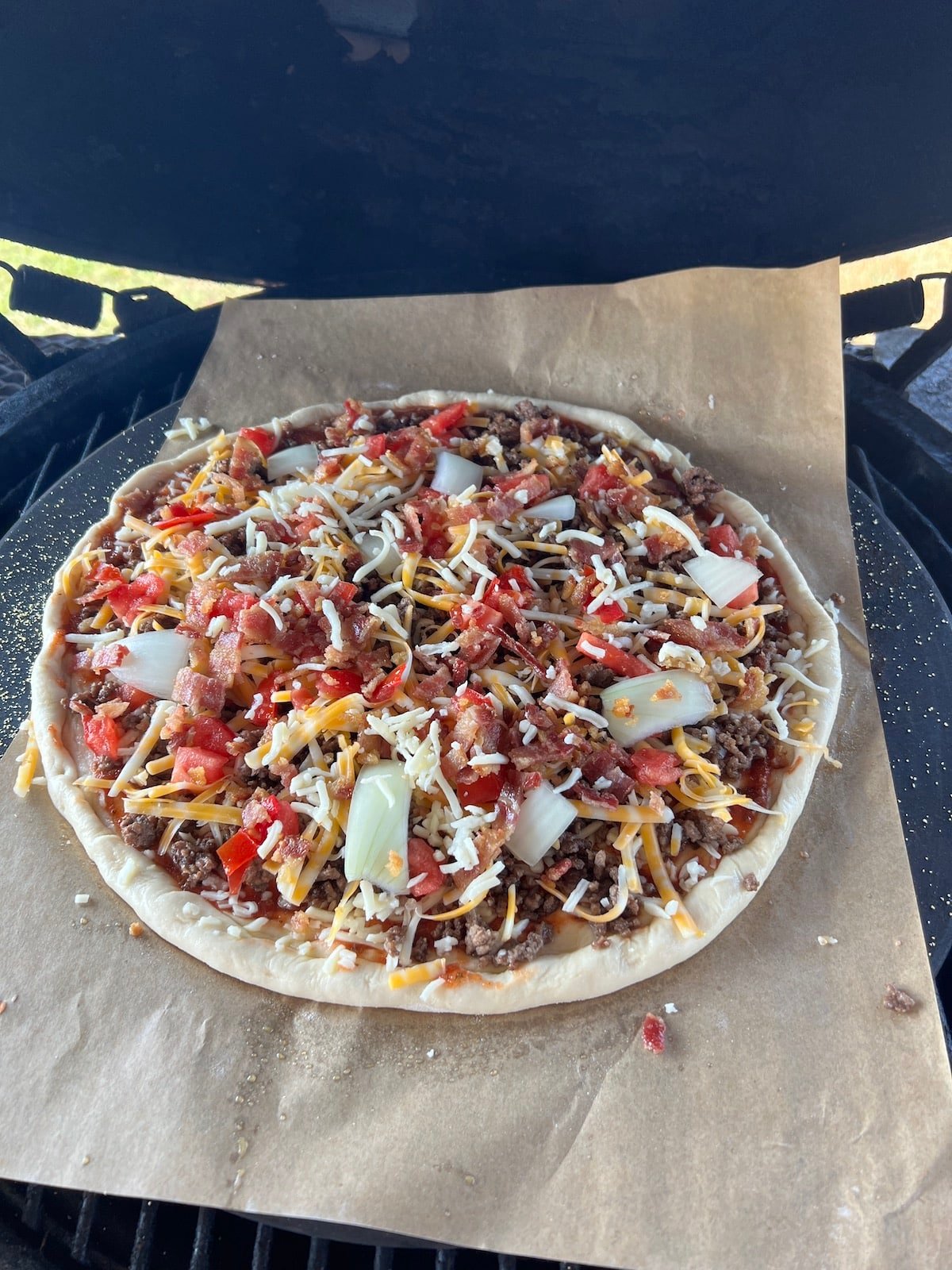 Pizza on a grill.