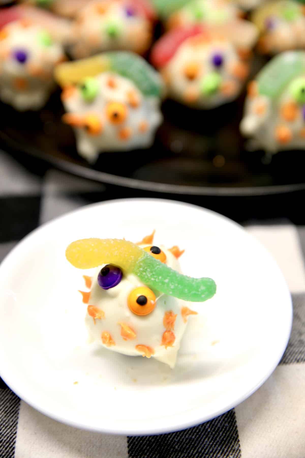 Monster cake ball on a small plate. 