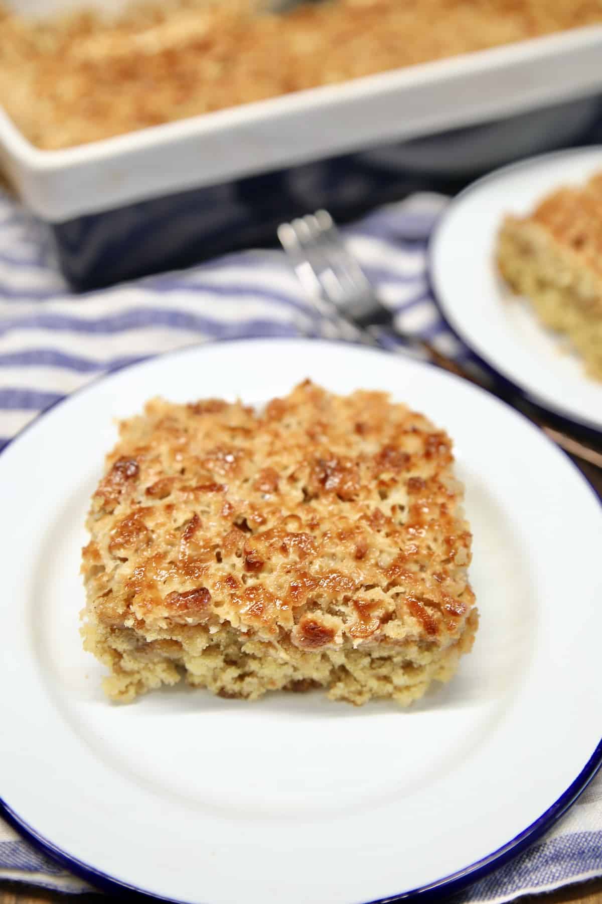 Oatmeal Cake with coconut frosting on a plate.