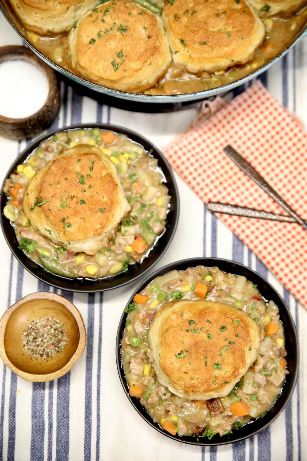 Overhead view of 2 bowls of beef pot pie.