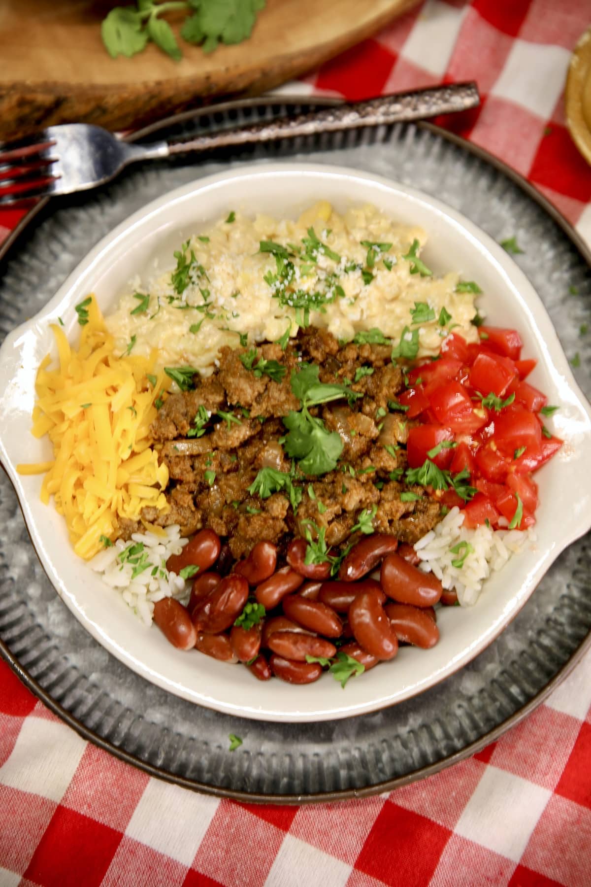 Ground beef burrito bowl with rice, beans and Mexican corn. Ground beef burrito bowl with beans, rice and corn.