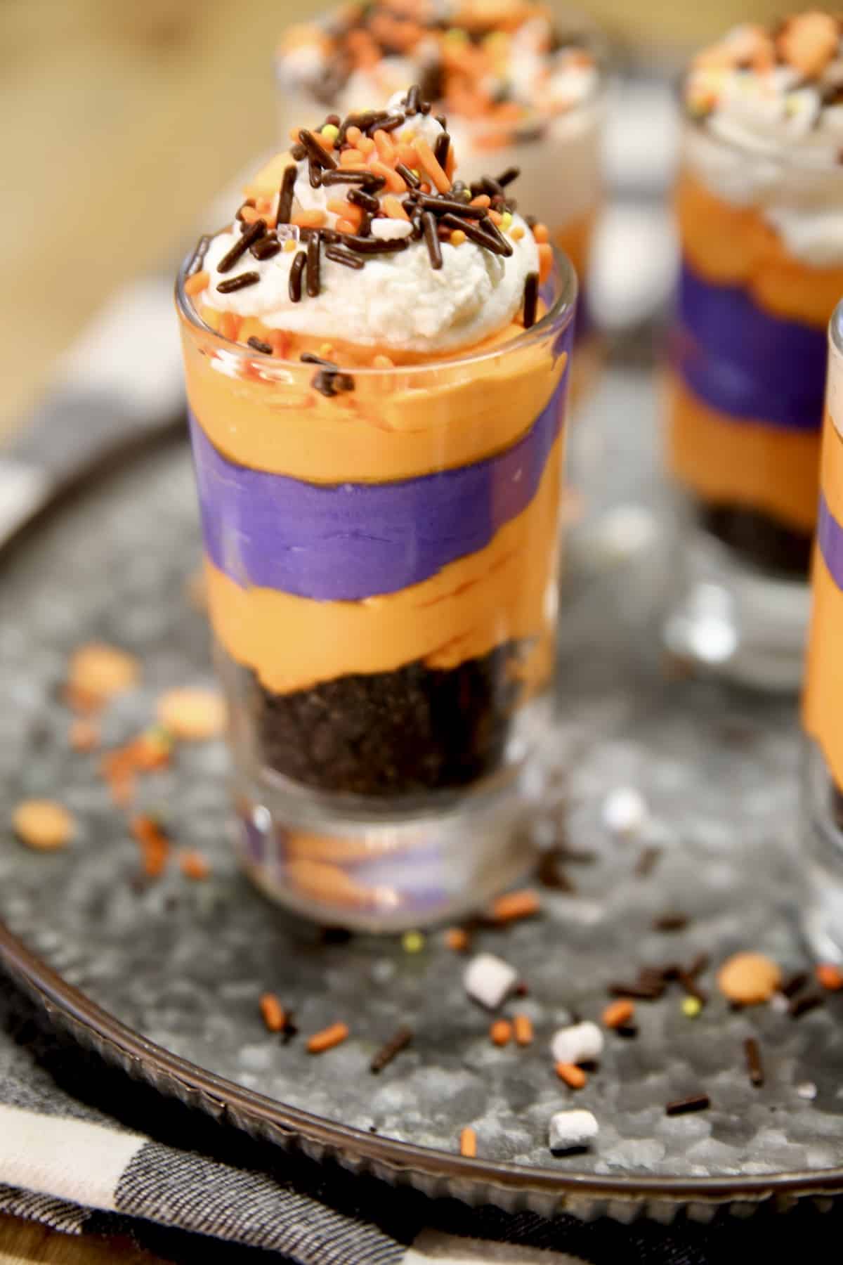 Layered no bake cheesecake, orange and purple. 