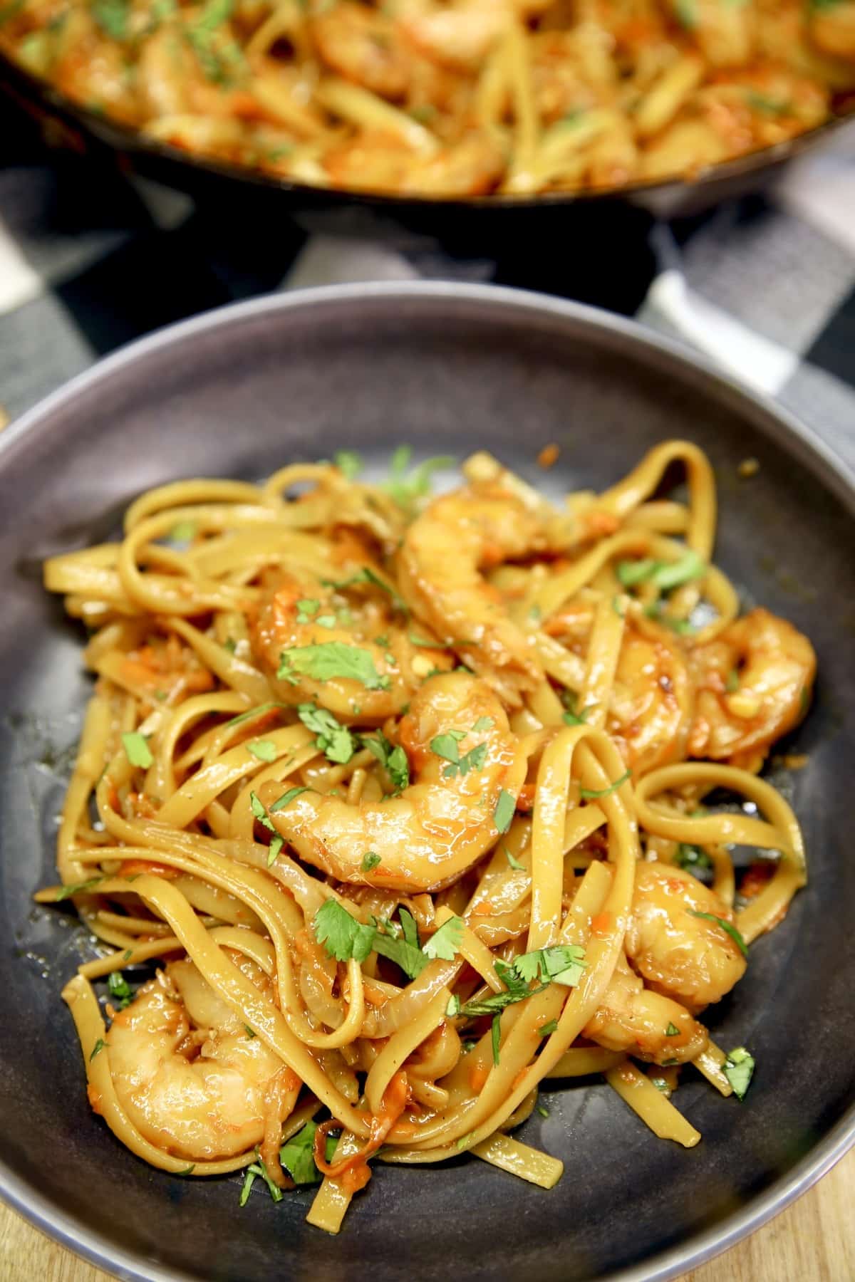 Bowl of Hoisin shrimp stir fry with noodles. 