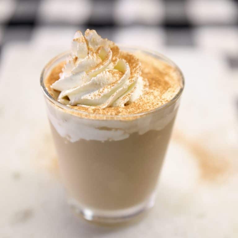 Pumpkin spice mudslide cocktail with whipped cream.
