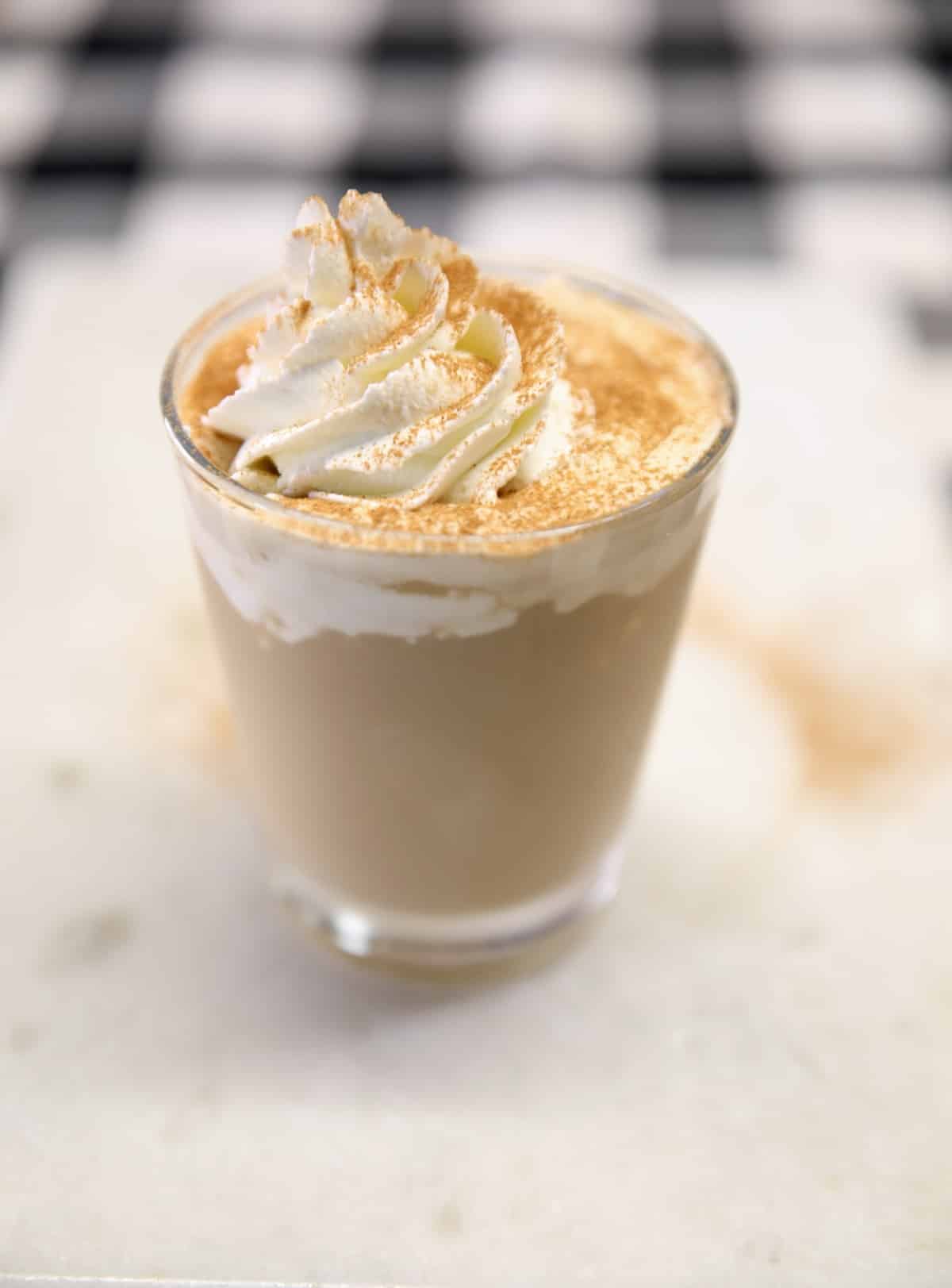 Pumpkin Spice rum cocktail. Pumpkin Spice Mudslide on a marble board.