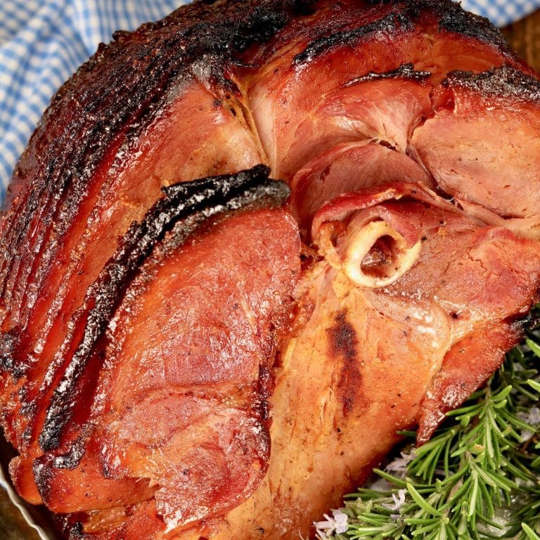 Glazed ham on a platter.