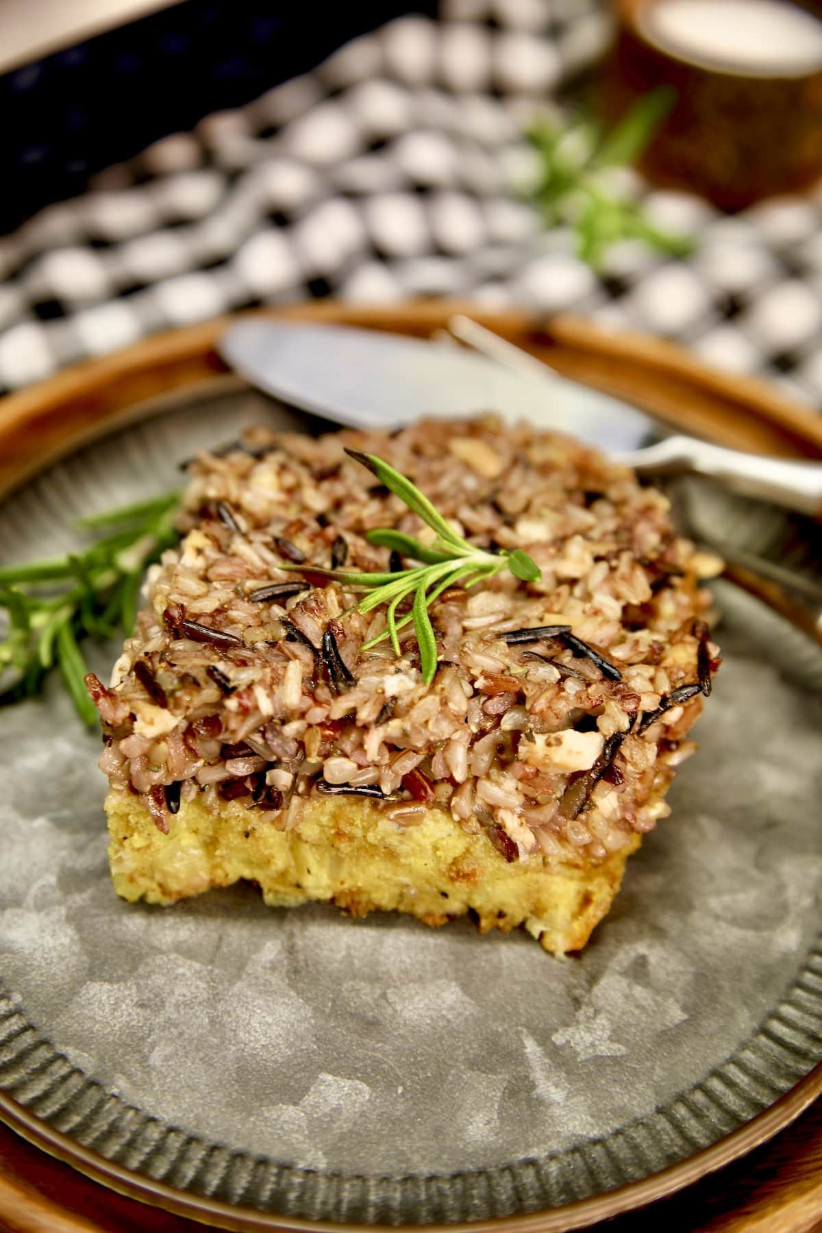 Slice of Thanksgiving dressing on a plate.