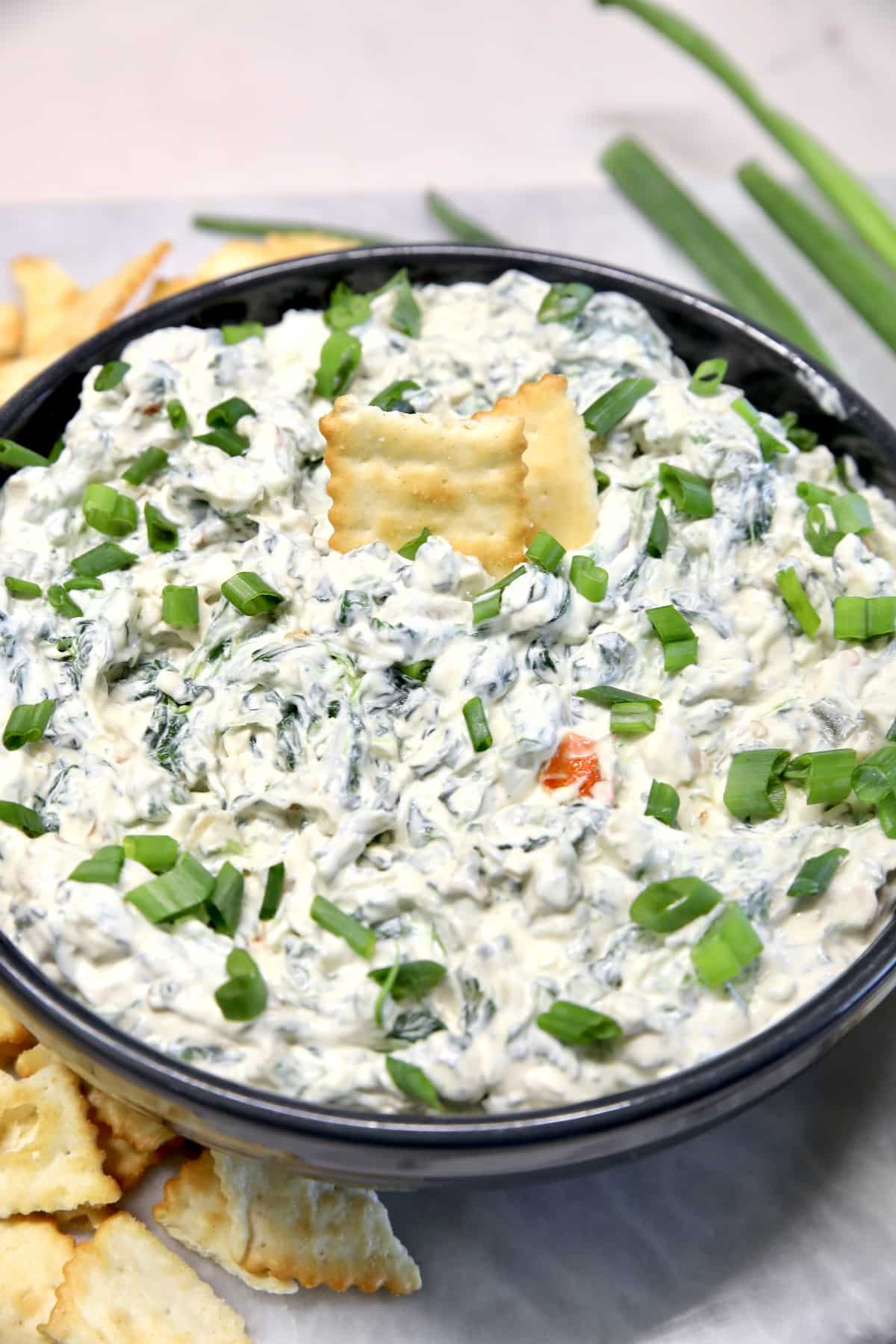 Knorr spinach dip in a bowl with cracker.