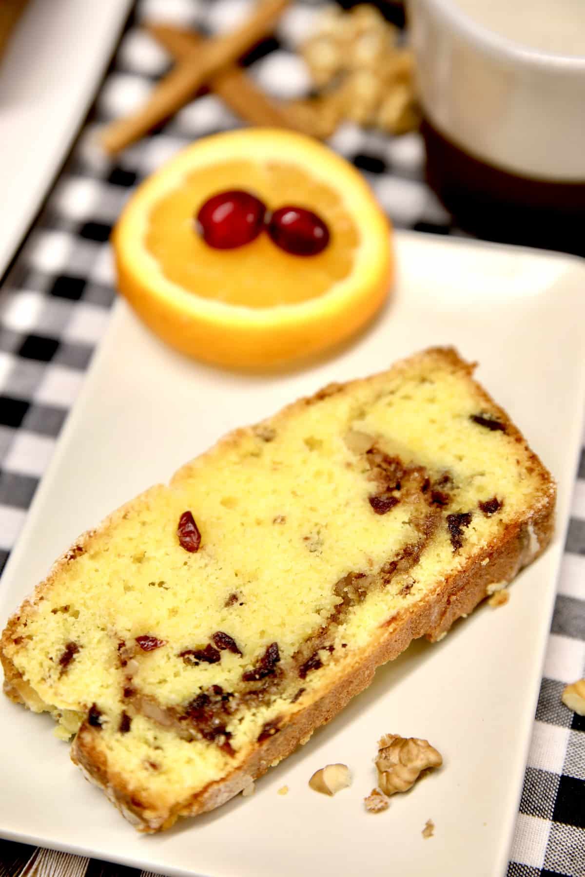 Closeup of cranberry orange cake slice.