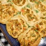 Sausage pinwheels on a platter.