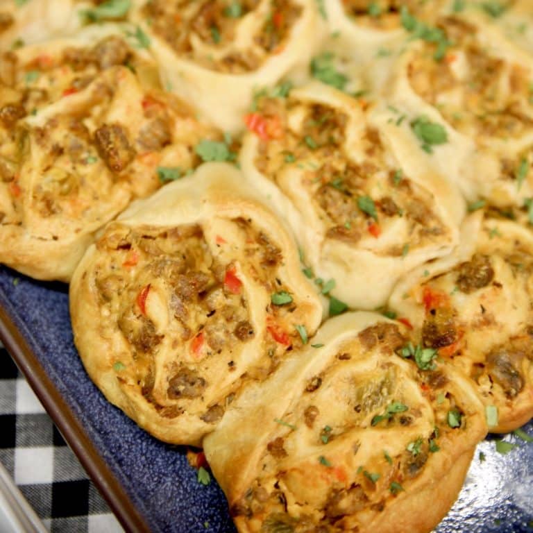 Sausage pinwheels on a platter.