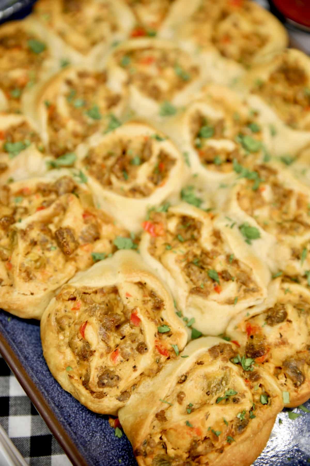 Sausage Pinwheels appetizers on a platter.