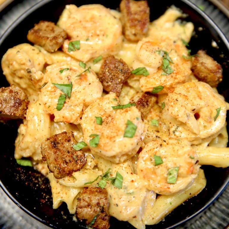 Cajun Steak and Shrimp Pasta in a black bowl.