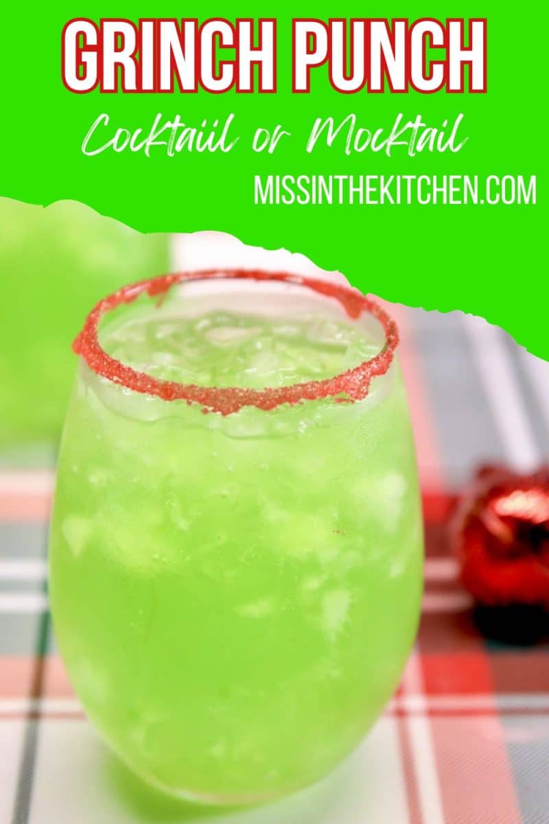 Green punch for Grinch Christmas theme in a glass.