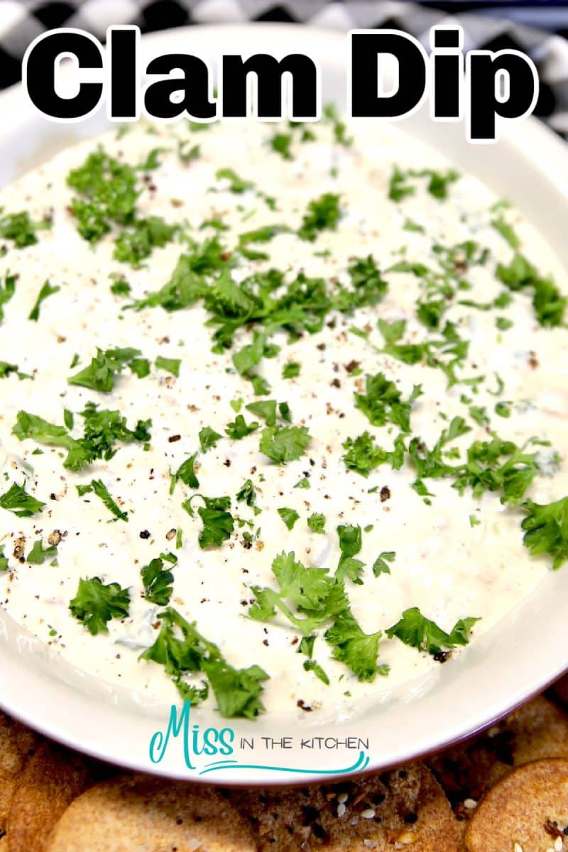Clam dip in a bowl- text overlay.