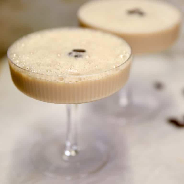 2 coupe glasses with Irish espresso martinis.
