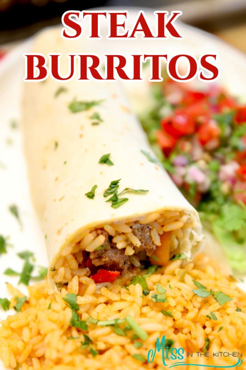 Steak Burrito on a plate with rice - text overlay.