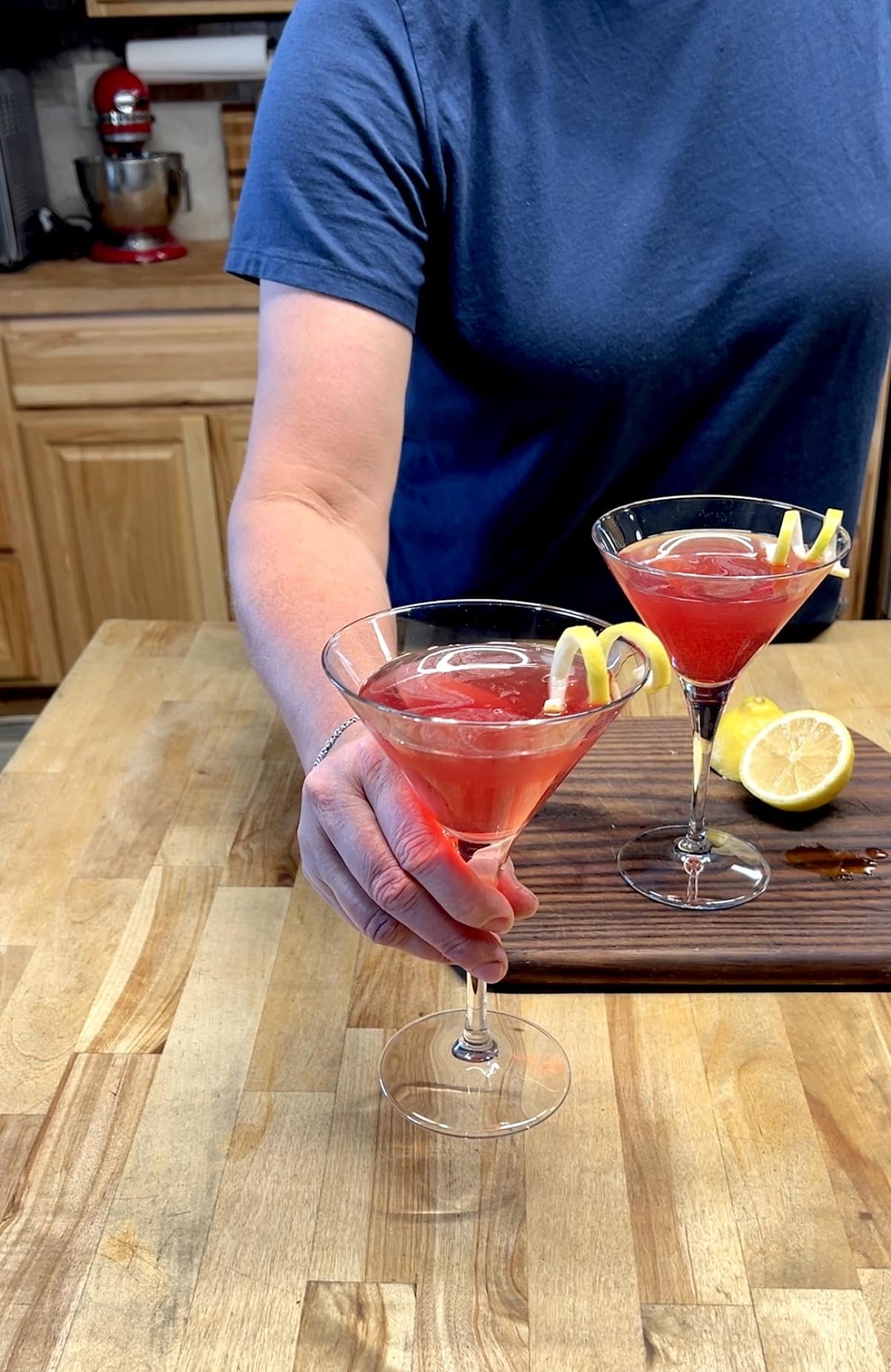 Serving vesper cocktail in a martini glass.