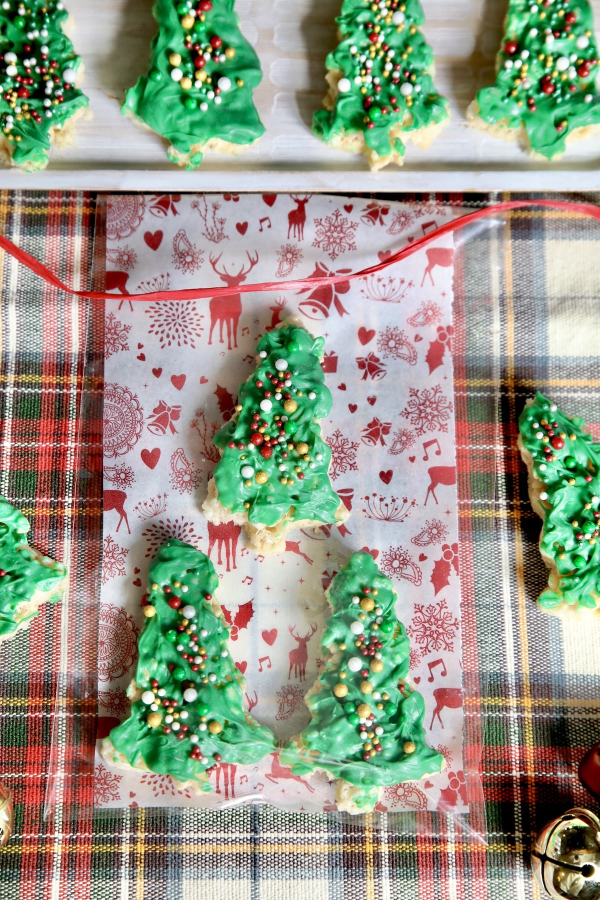 Christmas tree Rice Krispies treats in a cellophane bag.