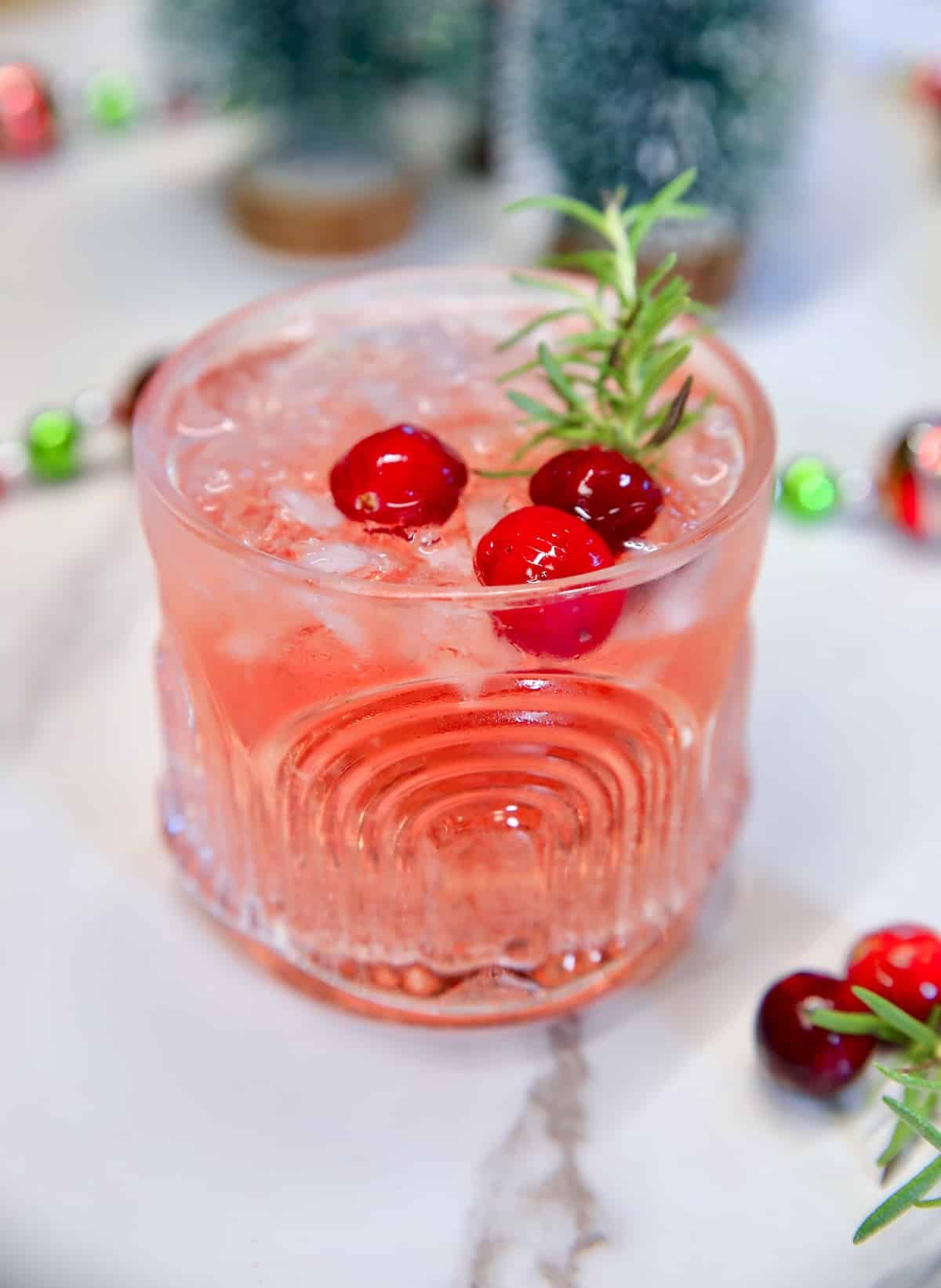 Cranberry drink in a old fashioned glass.