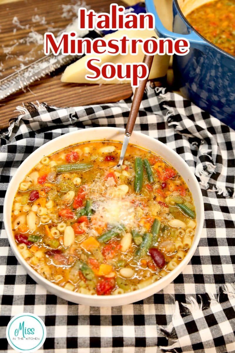 Bowl of vegetable soup with beans and pasta - text overlay.
