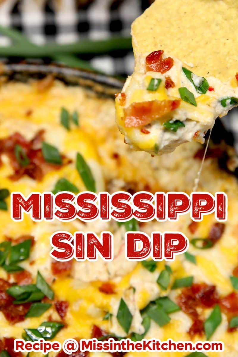 Mississippi Sin Dip party appetizer in a skillet with chip dipping. Text overlay.
