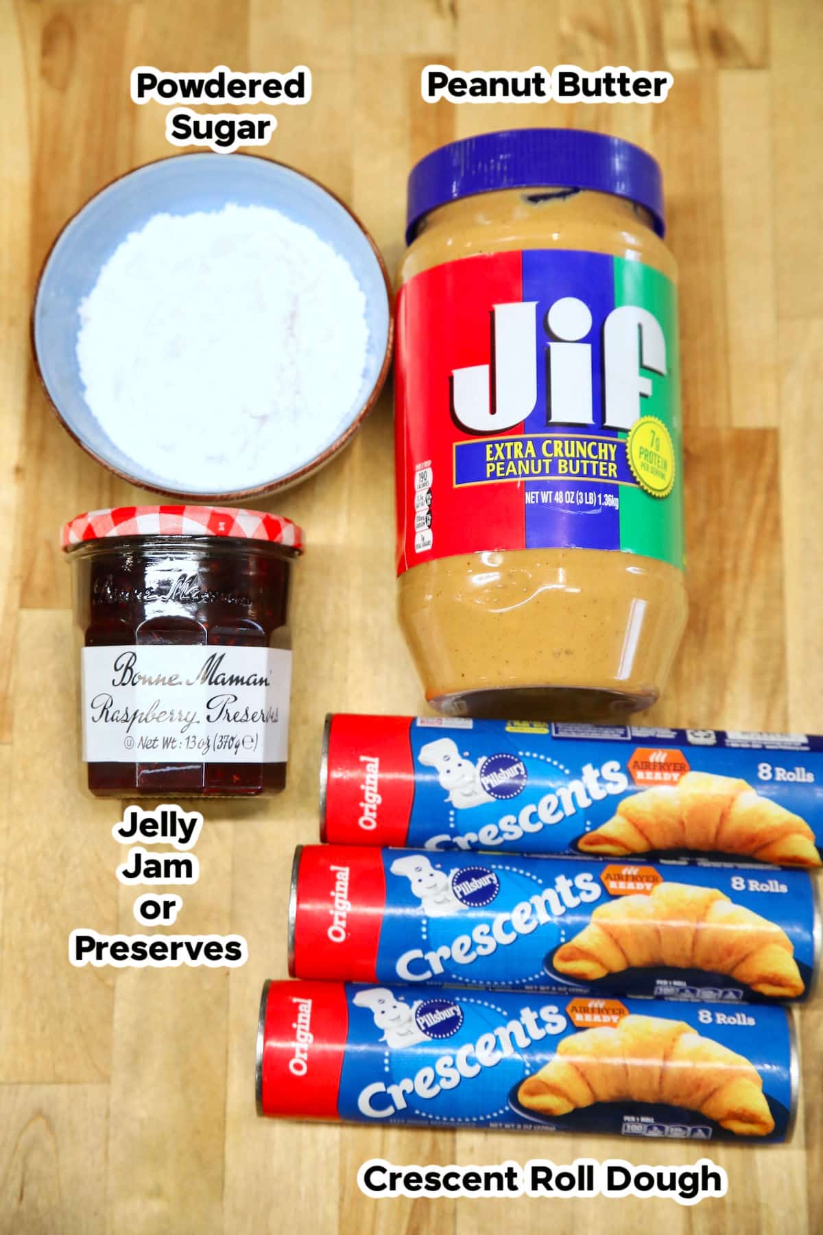 Ingredients for croissant muffins with peanut butter and jam.