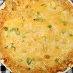 Buffalo chicken dip in a pie plate.