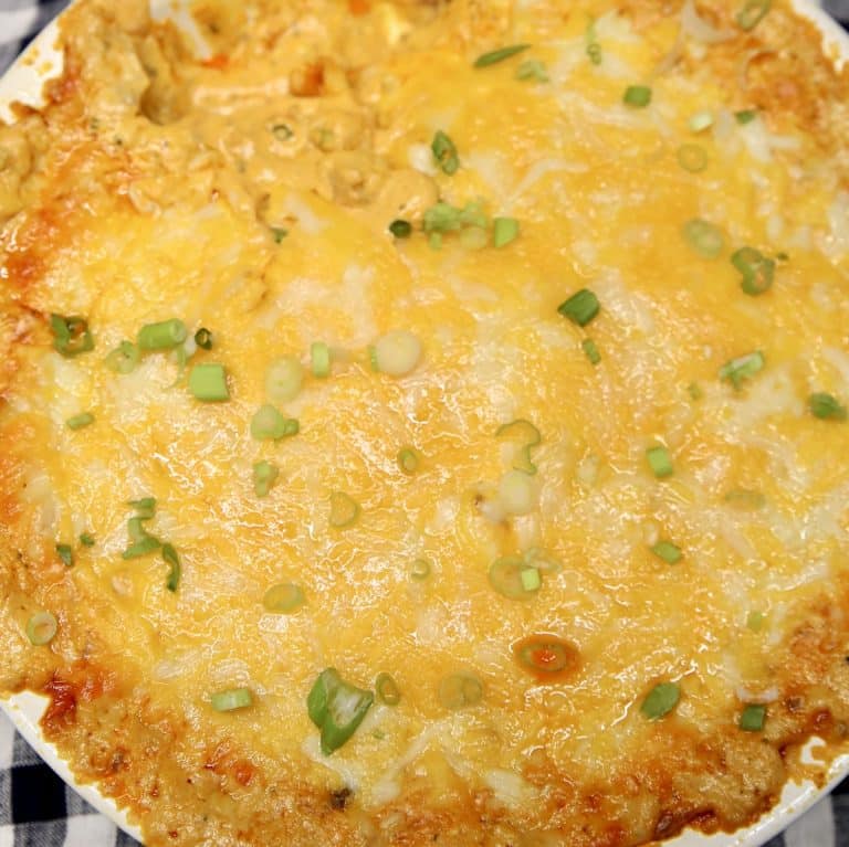 Buffalo chicken dip in a pie plate.