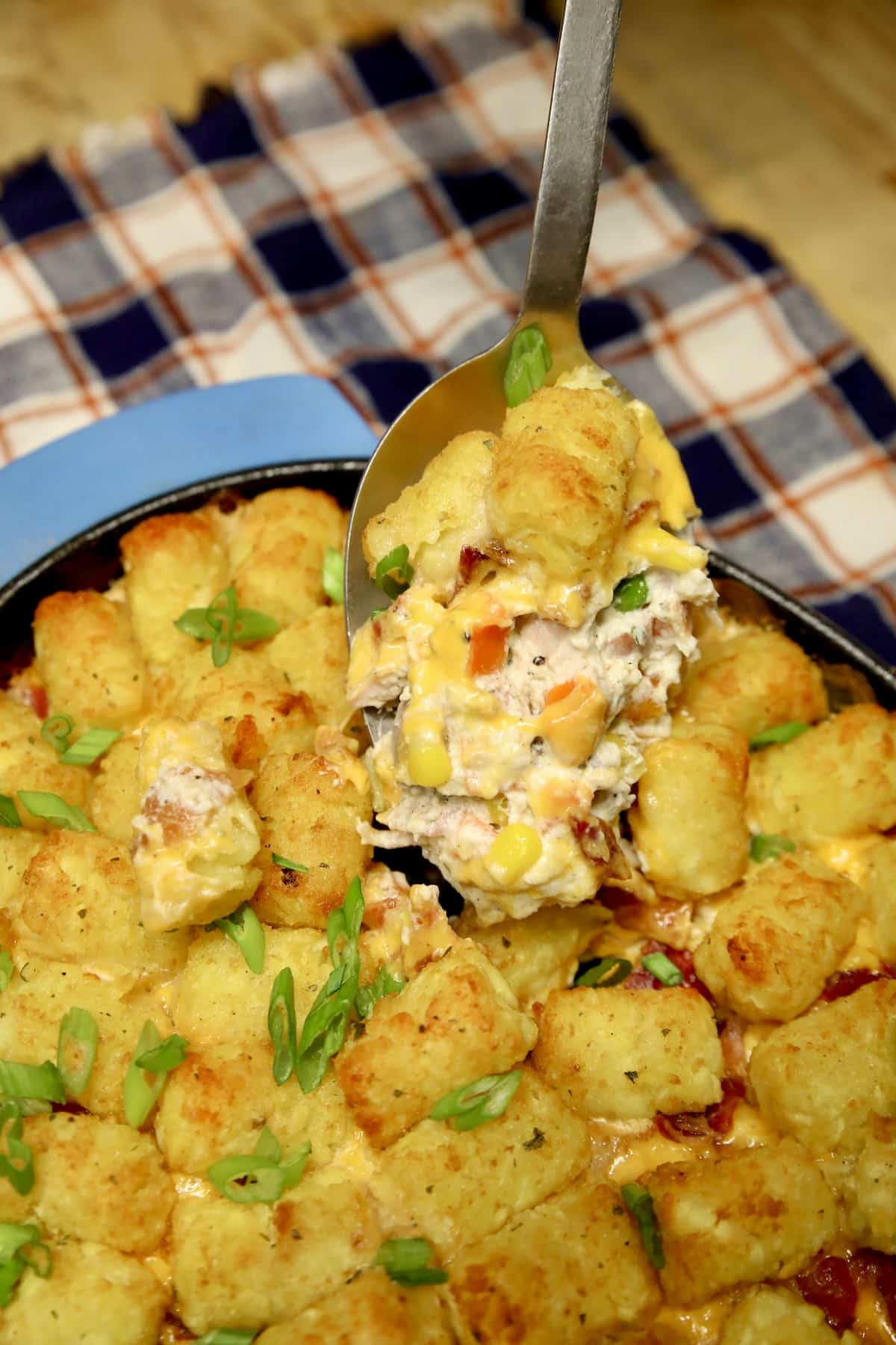Spoonful of chicken tater tot casserole.